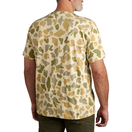 Man wearing a beige Carhartt camo shirt on a white background