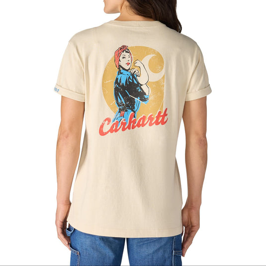 Person wearing a beige t-shirt with a graphic design and 'Carhartt' branding on the back.