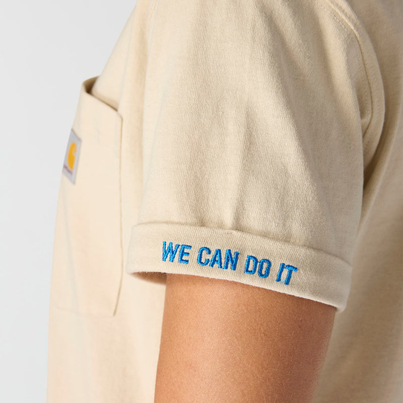 Load image into Gallery viewer, Beige shirt with 'We Can Do It' text on sleeve against a light gray background
