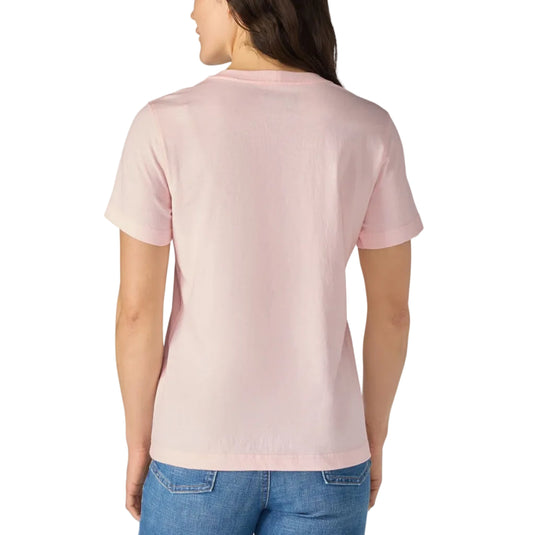 A woman viewed from the back wearing a light pink short-sleeve crewneck t-shirt and blue jeans, set against a plain white background.