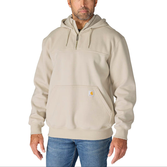 Man wearing a beige hoodie on a white background
