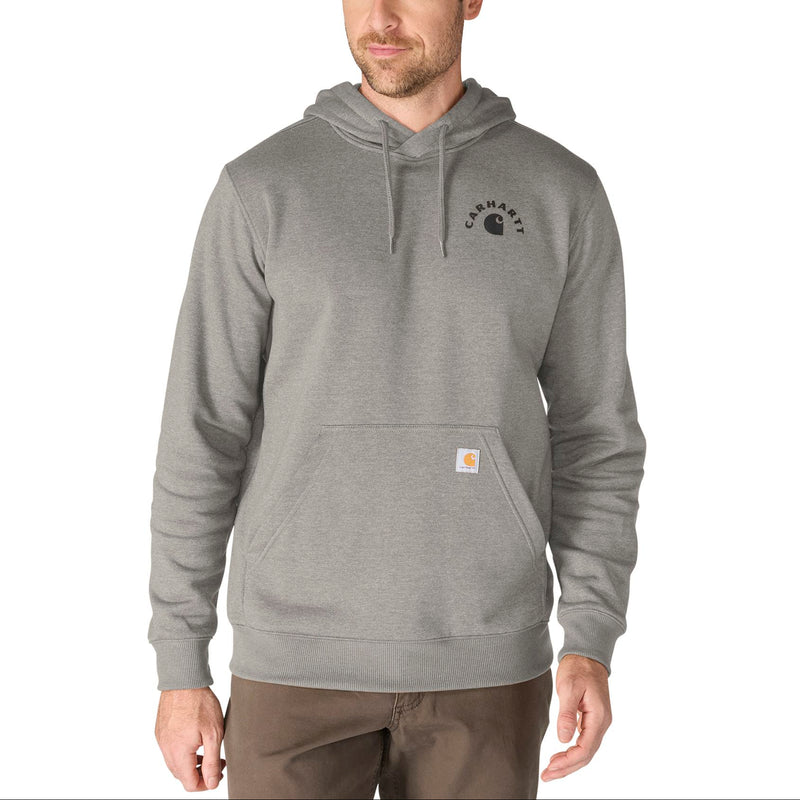 Load image into Gallery viewer, A man wearing a heather gray pullover hoodie with a black chest graphic and a small Carhartt logo patch on the front pocket, photographed against a plain white background.
