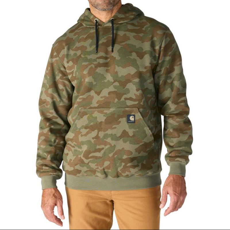 Load image into Gallery viewer, Man wearing a Army Green camouflage hoodie with a visible Carhartt brand logo on the front pocket on a white background
