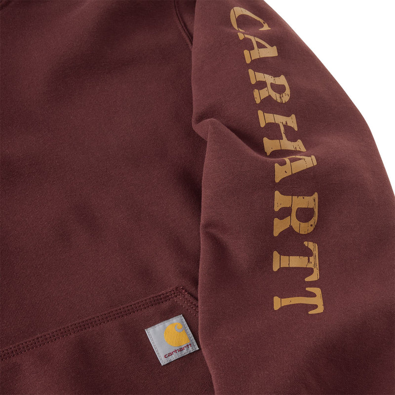 Load image into Gallery viewer, Close-up of a Carhartt sweatshirt in a dark burgundy color, featuring a large gold vertical 'CARHART' logo printed on the sleeve and a small Carhartt brand patch near the pocket.
