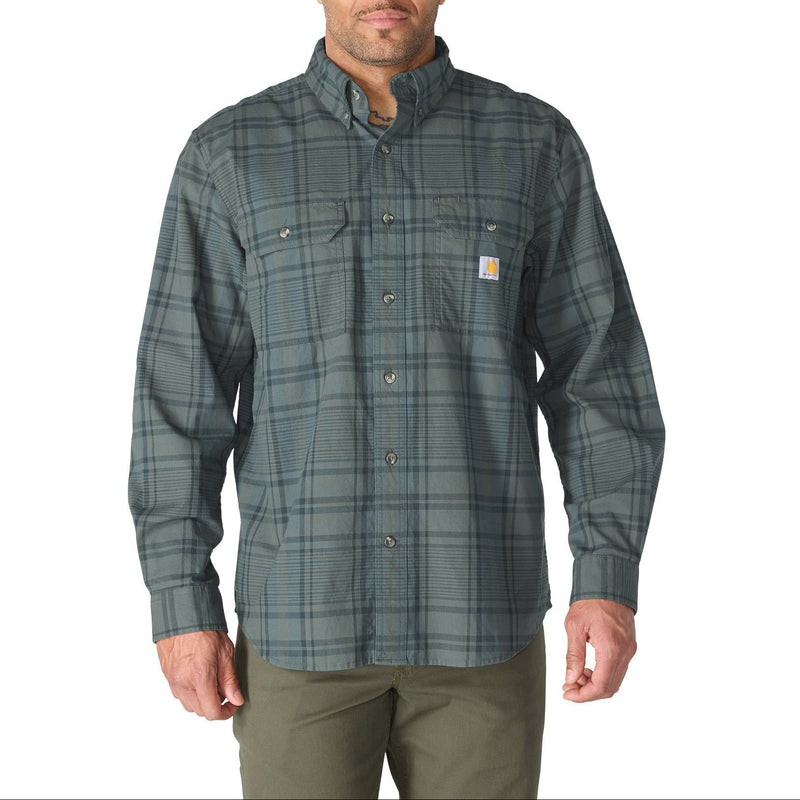 Load image into Gallery viewer, A man wearing a long-sleeve plaid button-up shirt in dark green and gray, paired with olive pants, against a plain white background.
