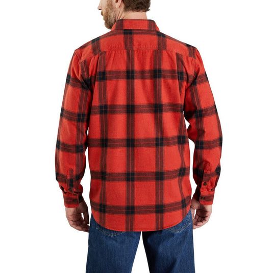 Red and black plaid shirt worn by a person on a white background