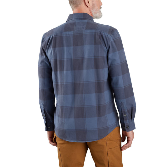 Man wearing a blue plaid shirt on a white background