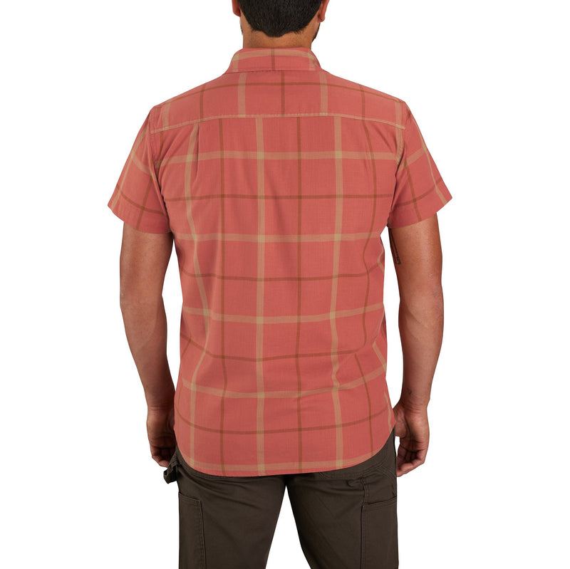 Load image into Gallery viewer, A man viewed from the back wearing a short-sleeve button-up shirt in a muted coral pink with a tan grid plaid pattern, paired with dark brown pants, against a plain white background.
