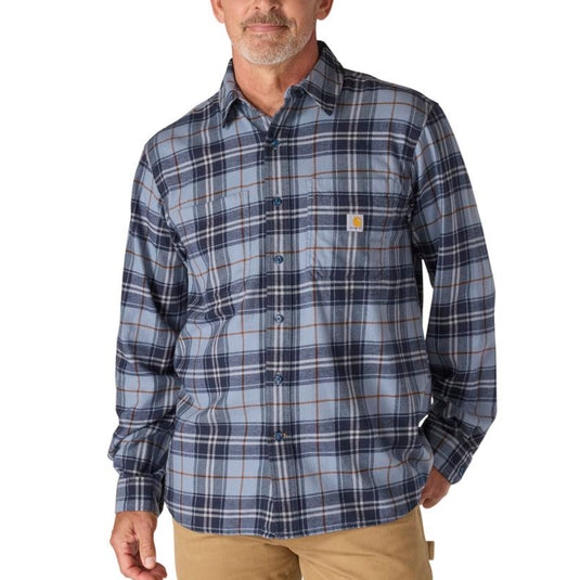 Man wearing a plaid shirt with a visible brand logo on a white background