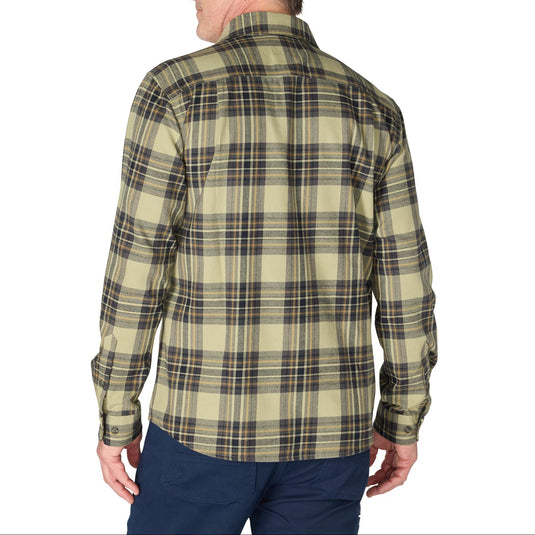 A man shown from the back wearing a long-sleeve plaid button-down shirt in olive green and beige with dark brown and black lines, paired with navy pants, against a plain white background.