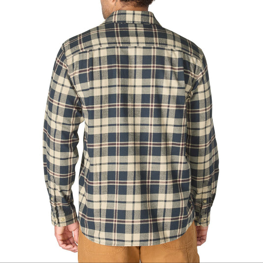 A man viewed from behind wearing a long-sleeve plaid button-up shirt in beige and navy blue, paired with tan pants, against a plain white background.