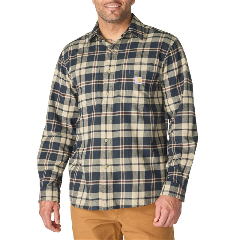 Load image into Gallery viewer, A man wearing a long-sleeve plaid button-up shirt in navy blue, beige, and white, paired with tan pants, against a plain white background.
