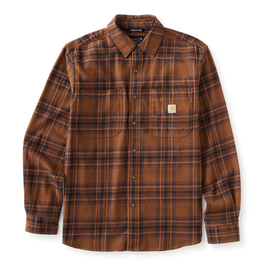 A long-sleeve plaid button-up shirt by Carhartt, featuring a brown, orange, and black tartan pattern with the signature Carhartt logo patch on the left chest pocket.