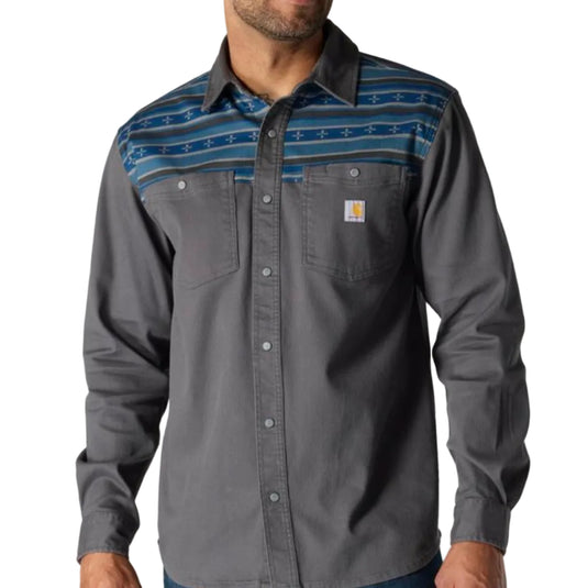 Man wearing a gray button-up shirt with a blue patterned chest panel on a white background