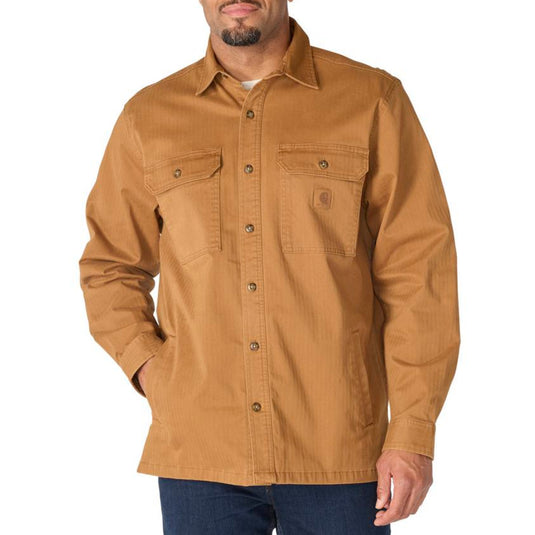 Man wearing a brown buttoned shirt with a white background