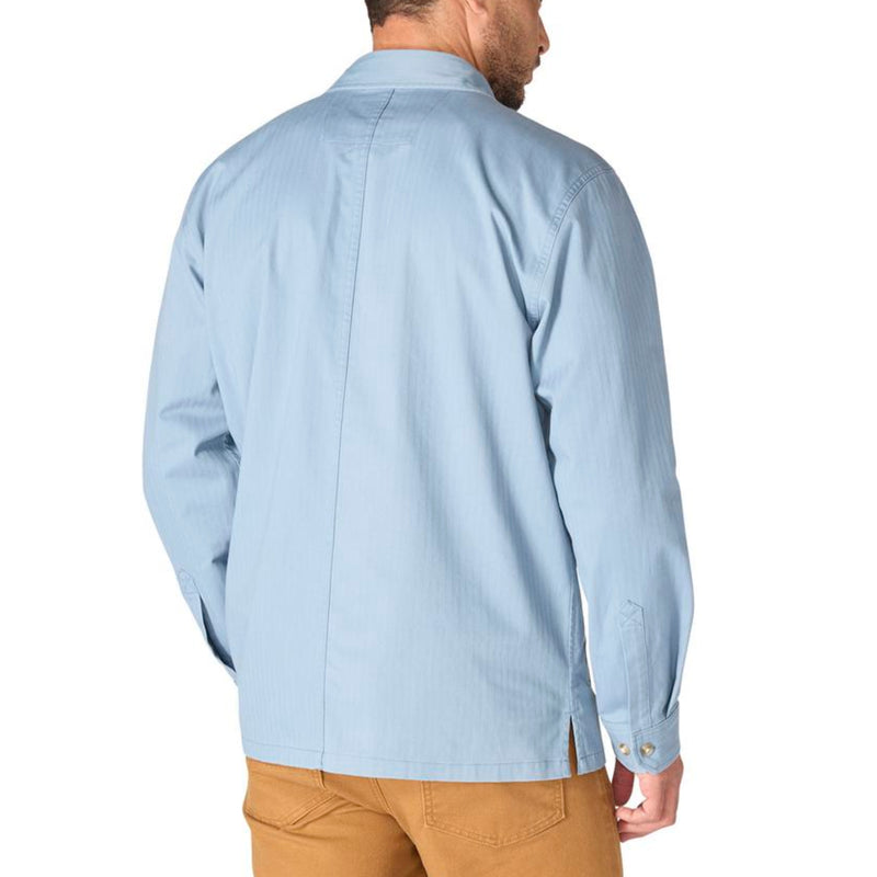 Load image into Gallery viewer, Man wearing a light blue button-up shirt and beige pants on a white background
