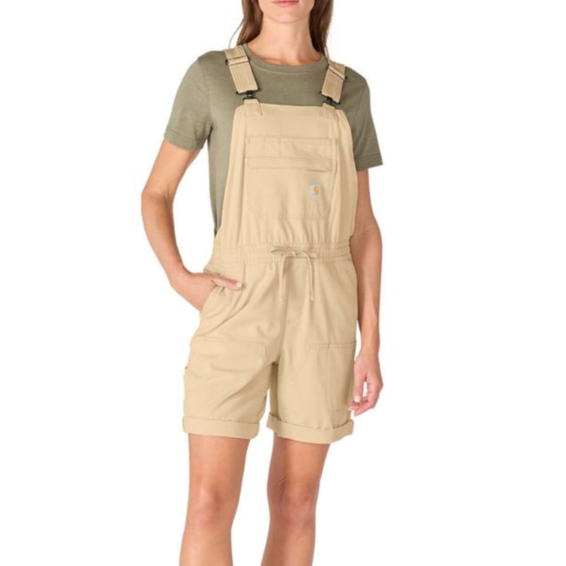 Load image into Gallery viewer, Woman wearing beige Carhartt shortalls and green shirt on a white background
