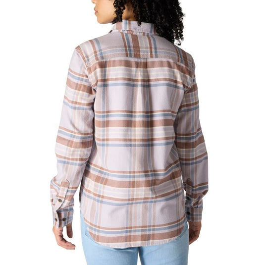 Person wearing a plaid shirt on a white background