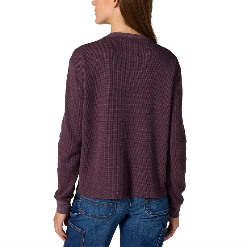 Load image into Gallery viewer, A woman shown from the back wearing a heathered dark plum long-sleeve crewneck top and blue jeans against a plain white background.
