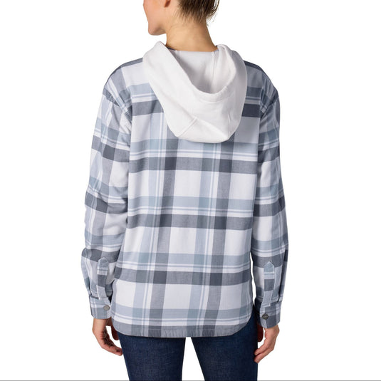 A woman shown from the back wearing a long-sleeve plaid hooded shirt in white, gray, and blue, paired with dark blue jeans, against a plain white background.