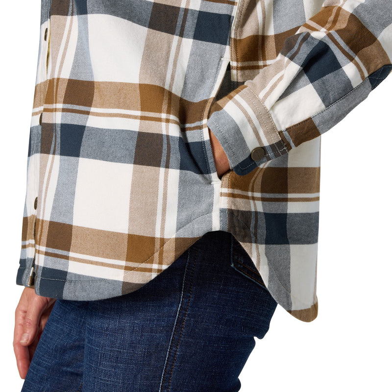 Load image into Gallery viewer, A close-up of a person wearing a long-sleeve plaid flannel shirt with blue jeans. The shirt features a pattern of brown, white, navy blue, and gray plaid, with the person's hand in their pocket.
