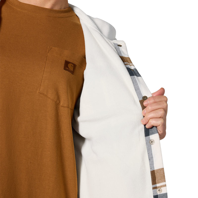Load image into Gallery viewer, A close-up of a person wearing a brown short-sleeve pocket T-shirt and holding open a white overshirt with a blue, beige, and brown plaid lining. A small brown logo patch is visible on the chest pocket of the shirt.
