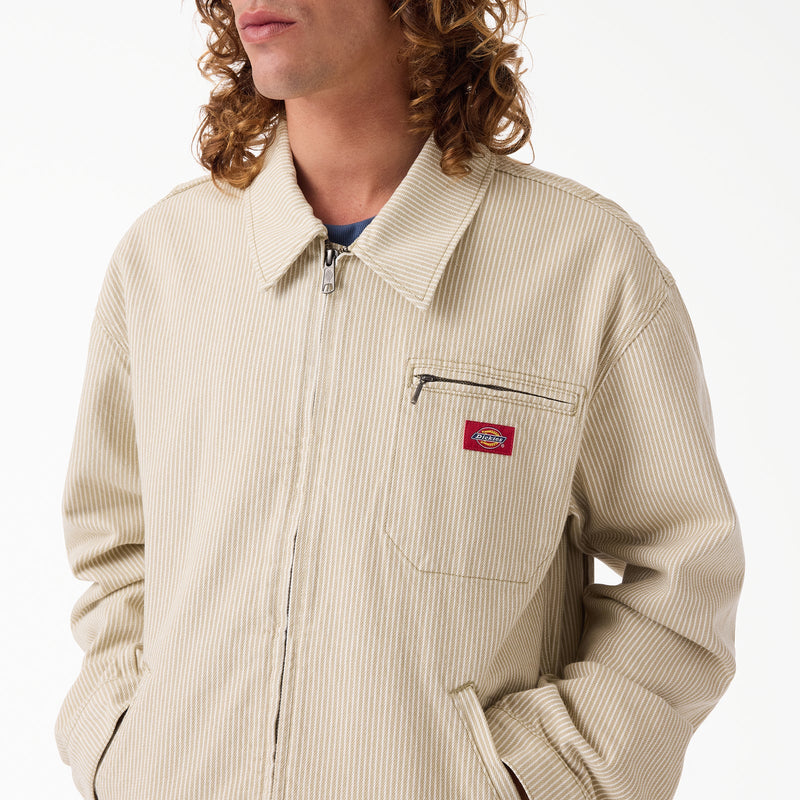 Load image into Gallery viewer, A close up of a model wearing a timeless retro khaki hickory stripe painter's jacket.
