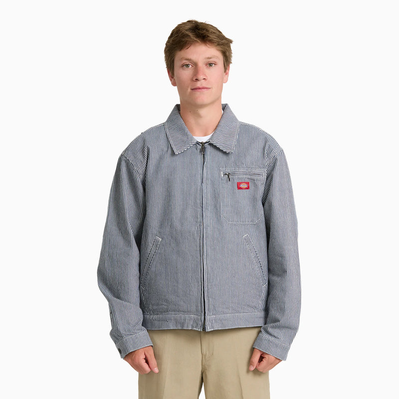 Load image into Gallery viewer, A model wearing a timeless retro indigo blue hickory stripe painter's jacket.
