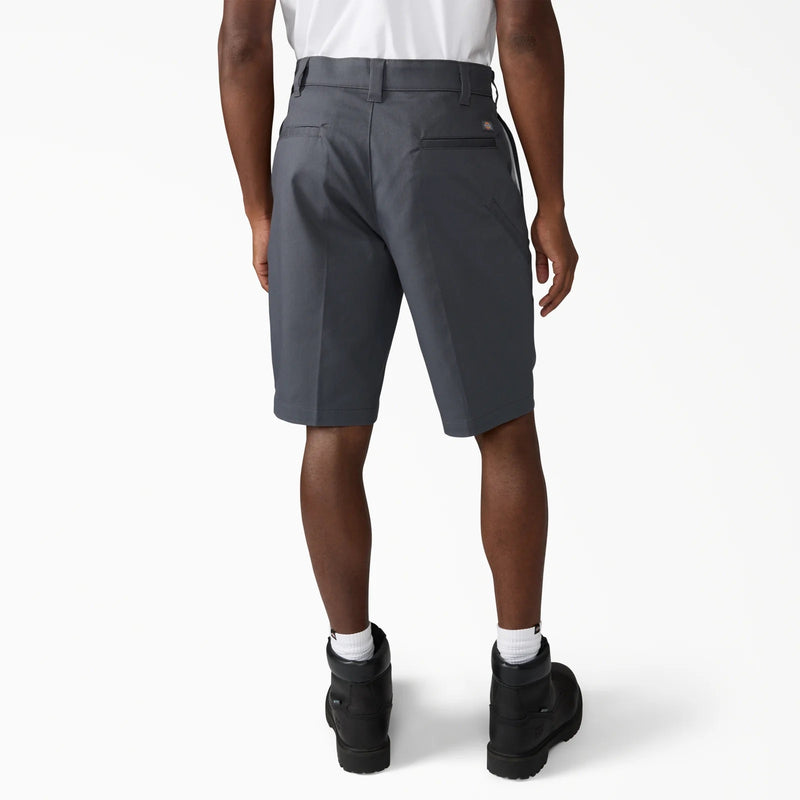 Load image into Gallery viewer, Person wearing gray shorts on a white background
