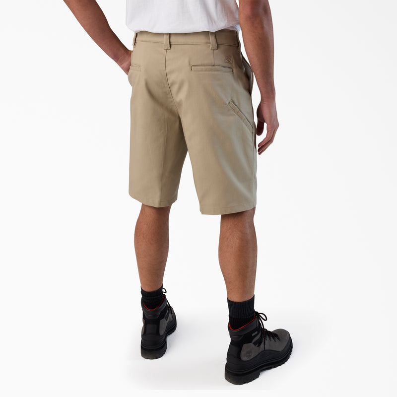Load image into Gallery viewer, Person wearing beige shorts on a white background
