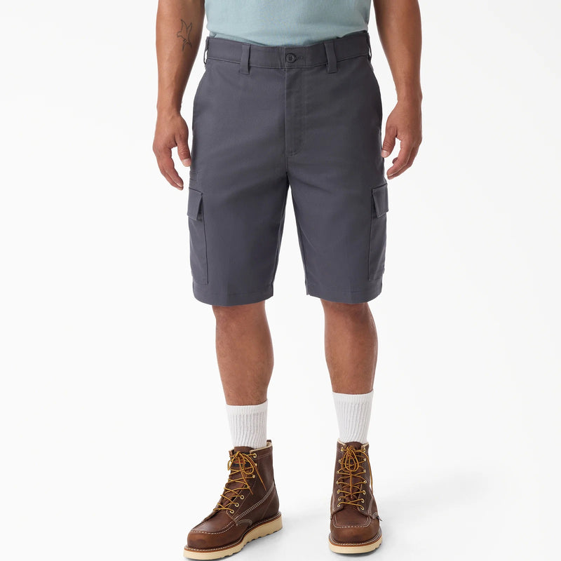 Load image into Gallery viewer, Person wearing gray cargo shorts with a white background
