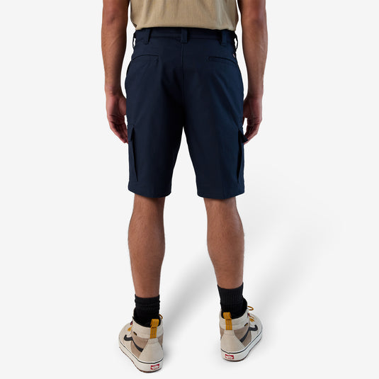 Person wearing navy shorts on a white background