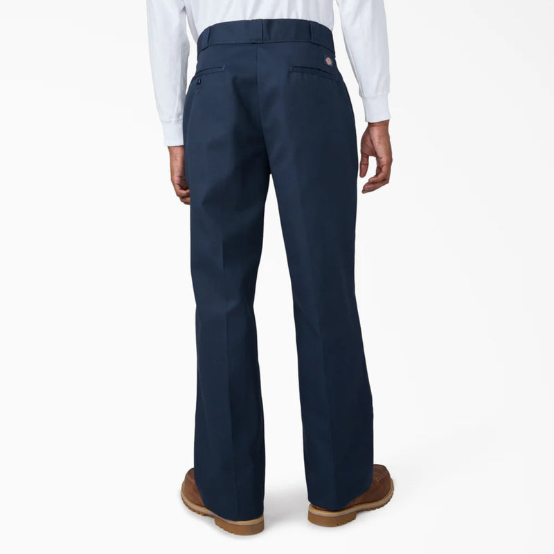 Load image into Gallery viewer, Navy loose fit work pants worn by a person on a white background
