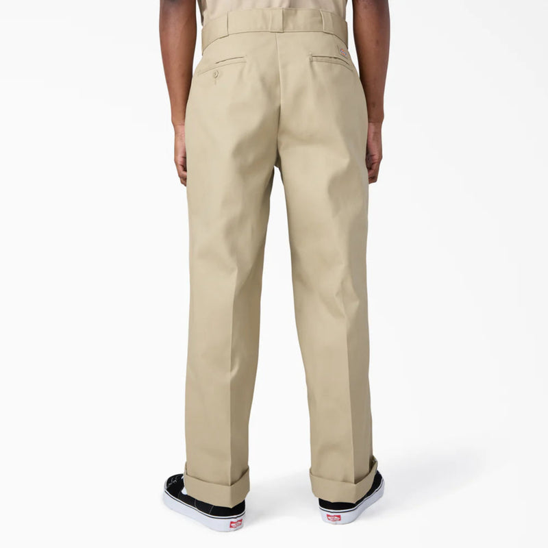 Load image into Gallery viewer, Khaki loose fit work pants worn by a person on a white background
