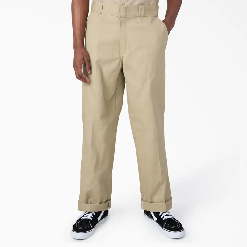 Load image into Gallery viewer, Khaki loose fit work pants worn by a person on a white background
