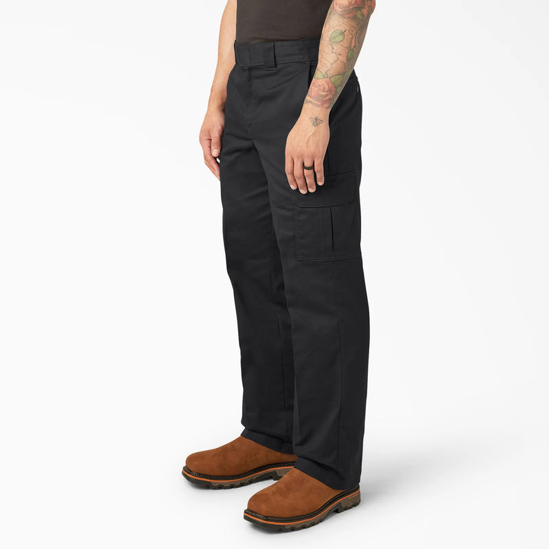 Load image into Gallery viewer, Person wearing black Dickies carg pants and brown boots on a white background
