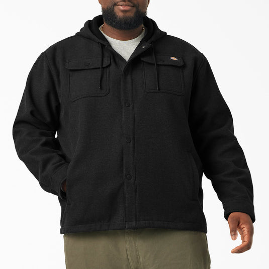 Man wearing a black jacket on a white background