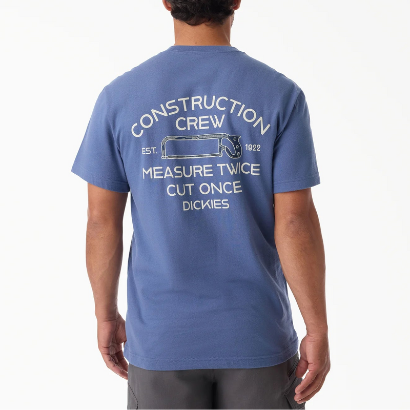 Load image into Gallery viewer, Person wearing a blue 'Construction Crew' Dickies t-shirt on a white background
