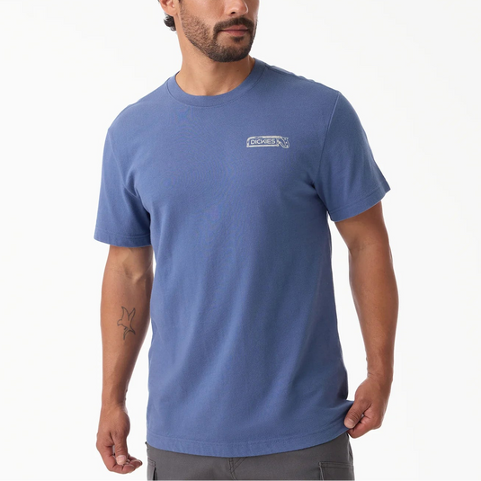 Man wearing a blue t-shirt with a logo on a white background
