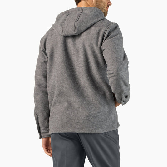 Man wearing a gray hooded jacket on a white background