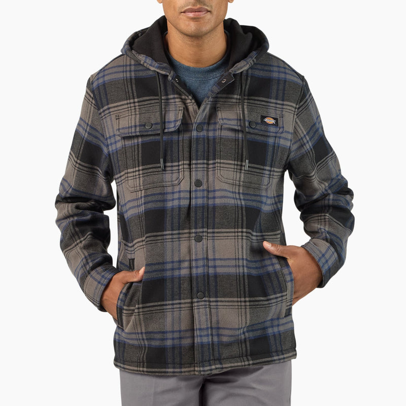 Load image into Gallery viewer, Man wearing a Slate plaid snap on jacket with a hood on a white background
