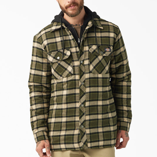 Man wearing a plaid jacket on a white background