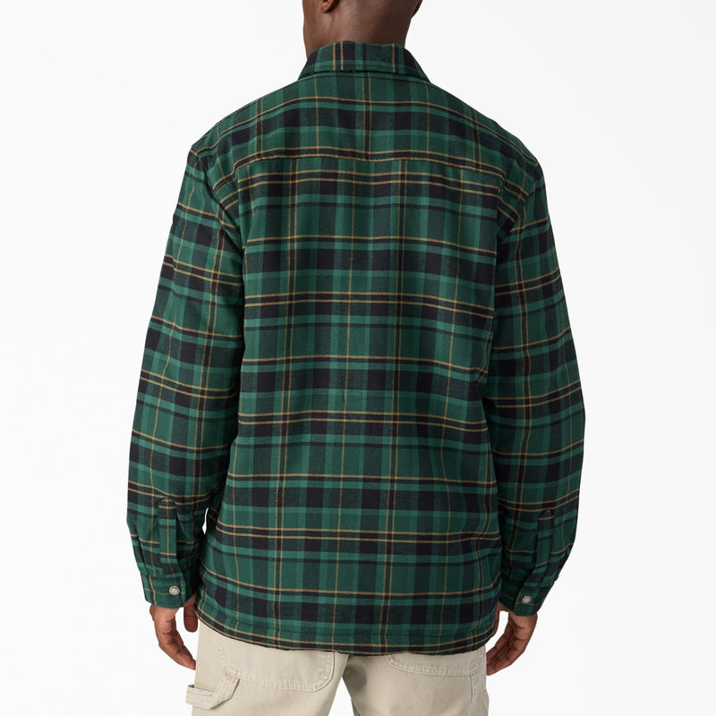 Load image into Gallery viewer, Man wearing a green plaid shirt on a white background
