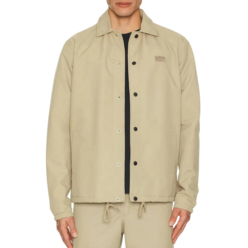 Load image into Gallery viewer, Person wearing a Khaki coaches jacket set on a white background
