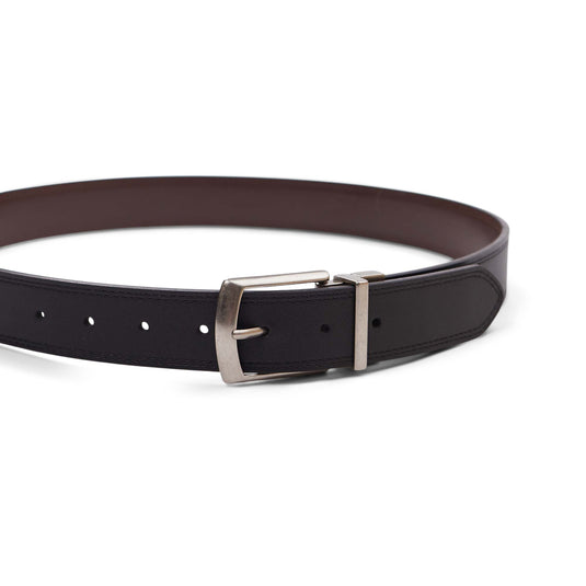 Black belt with a brown interior and a silver buckle on a white background. 