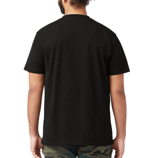 Person wearing a black t-shirt and camouflage pants on a white background