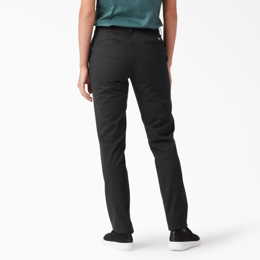 Person wearing black pants on a white background