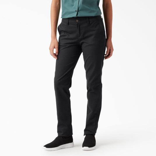 Person wearing black pants on a white background