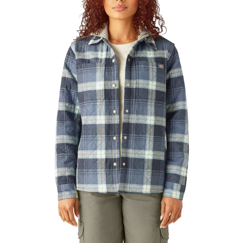 Load image into Gallery viewer, Woman wearing a blue plaid shirt on a white background
