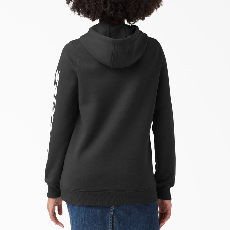Load image into Gallery viewer, Person wearing a black hoodie with a brand logo on the back, standing against a white background
